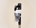 Close-up side view of Levoit AERO™ cordless vacuum handle and dustbin docked on the auto-empty station